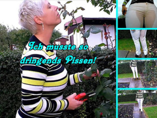 In die Weiße Hose gepisst bei der Gartenarbeit