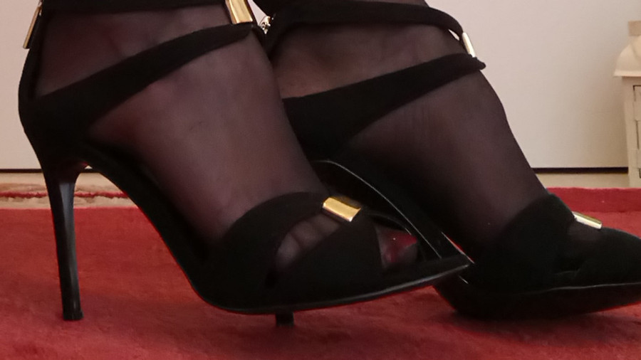 neat feet in nylons and high heels always an eye-catcher