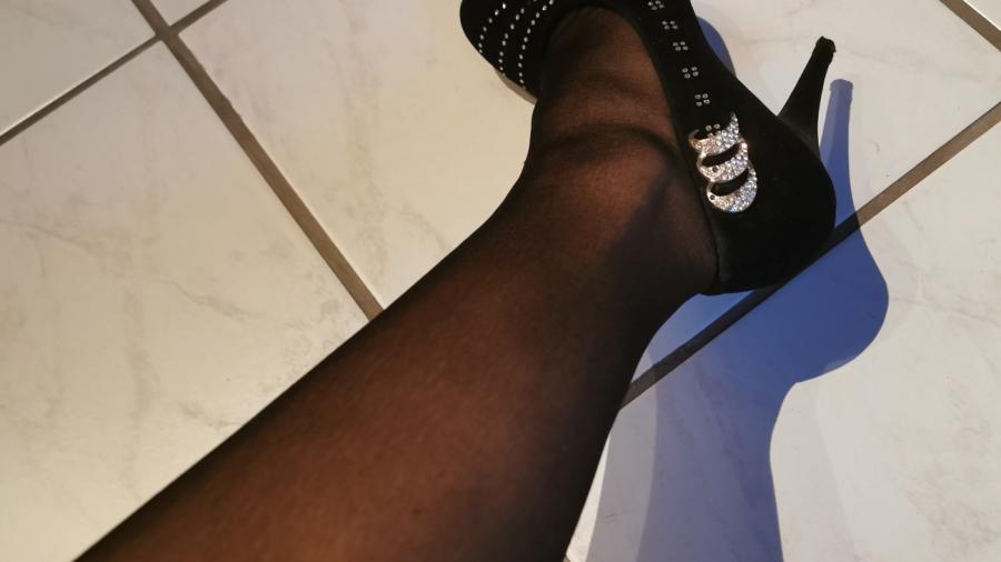 Black nylons in black heels