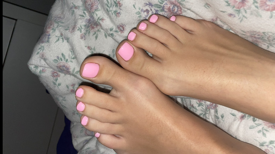 Füße mit pinkem sexy Nagellack