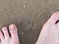 My feet in the sand, walk on the beach