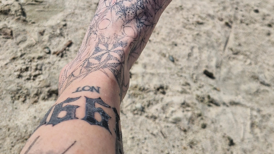 Tattoowierte Füße