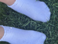 Schmutzige weiße Socken