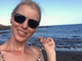 Am Meer, die Sonne geht langsam unter
