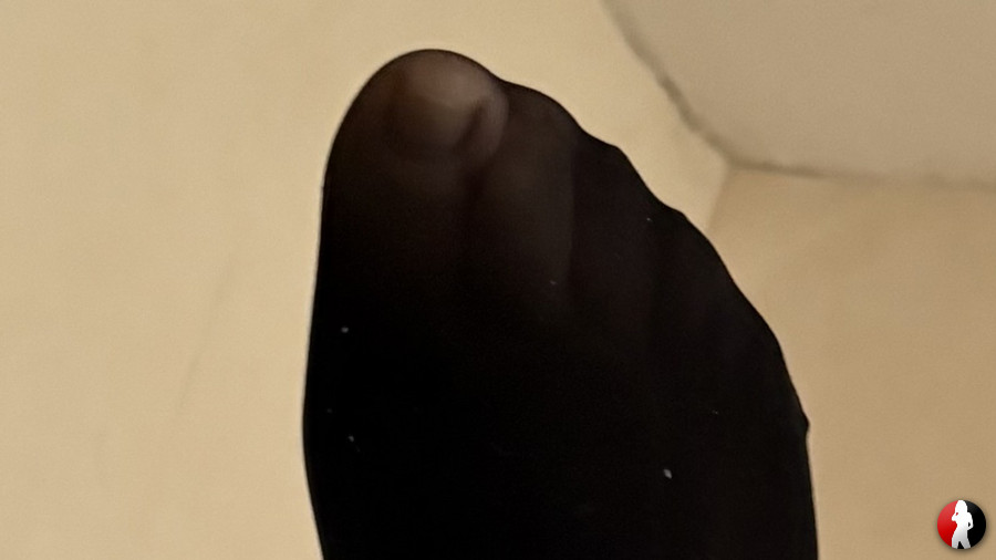 Füße in Nylonstrümpfen