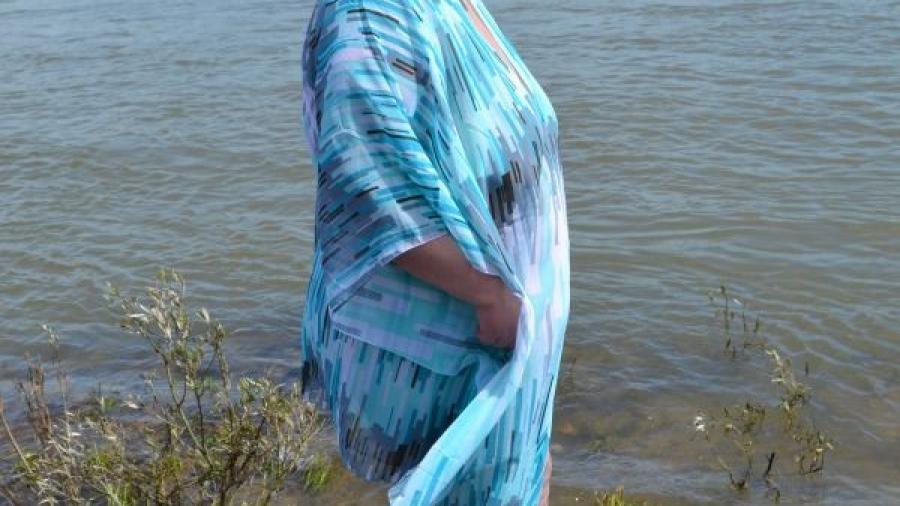 Lady in blue beach dress 3